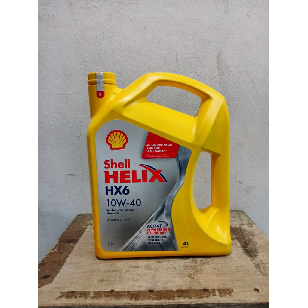Oli Mesin Mobil Shell Helix HX6 SAE 10W-40 Kemasan 4 liter. Mobil Bensin umur 5-10 tahun