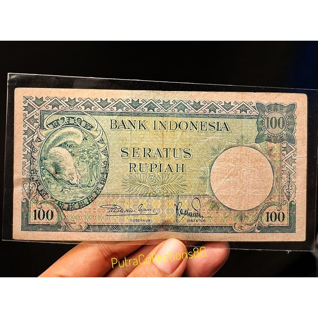 uang 100 rupiah Seri hewan Tupai prefik 2 huruf sesuai foto (A28)