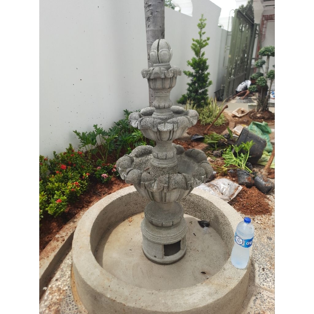 Taman kolam ikan minimalis air mancur