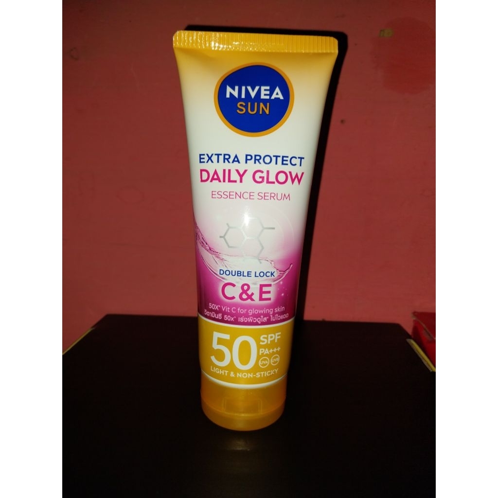 NIVEA SUN EXTRA PROTECT DAILY GLOW ESSENCE SERUM DOUBLE LOCK C&E SPF 50 PA+++/NIVEA BODY SERUM/NIVEA