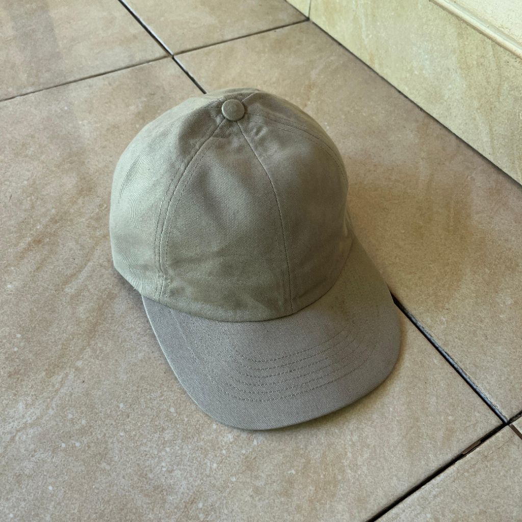 topi uniqlo warna coklat strap kulit