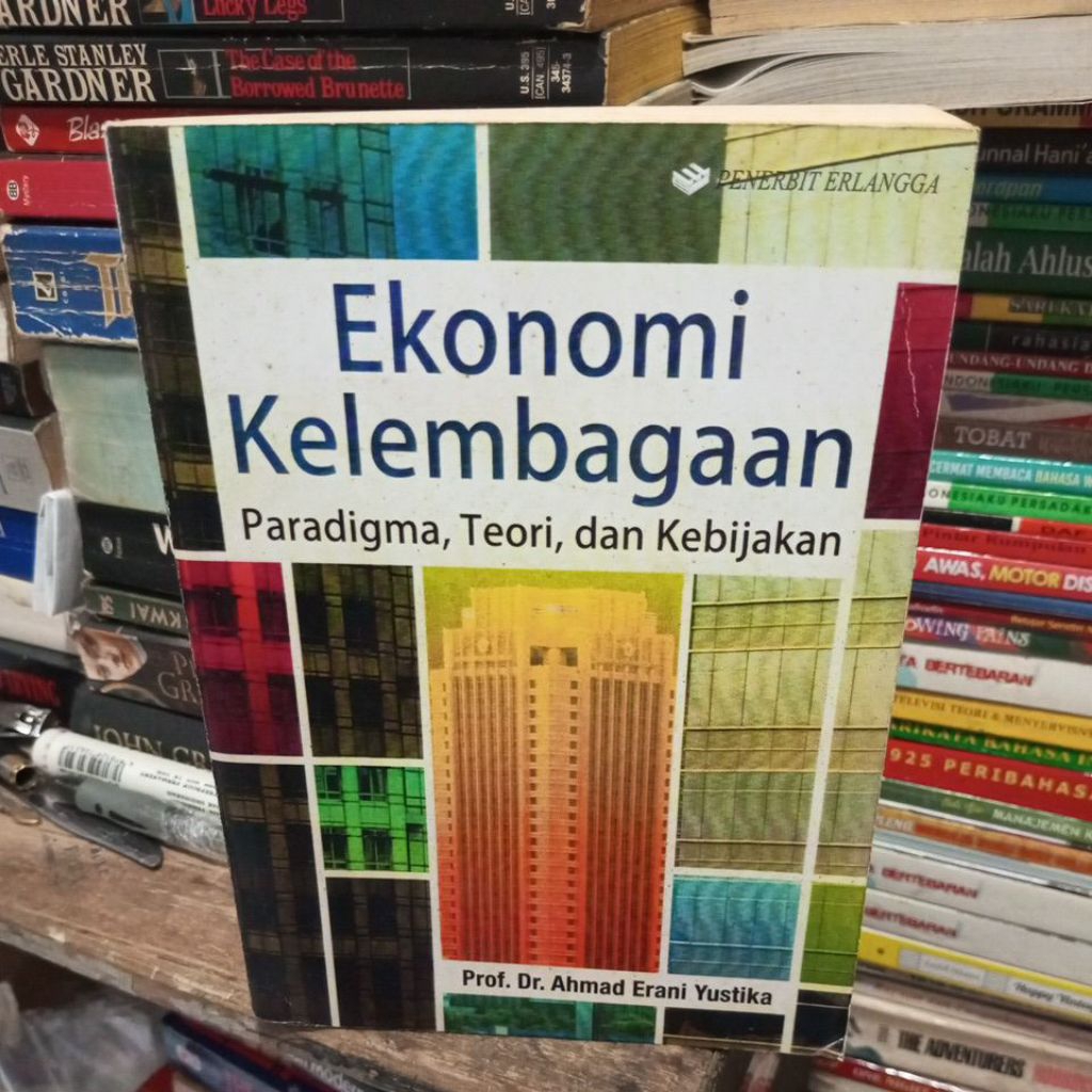 EKONOMI KELEMBAGAAN PROF.DR.AHMAD ERANI YUSTIKA