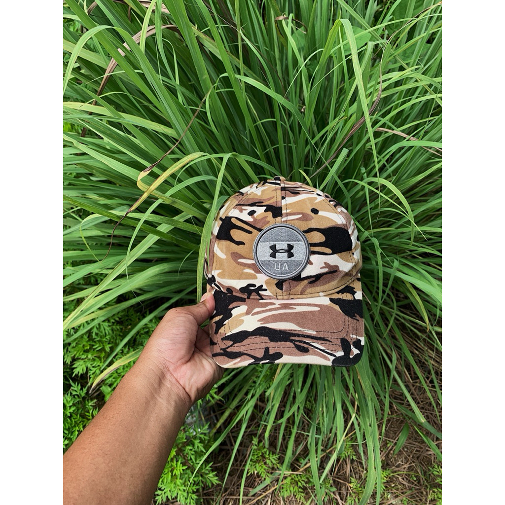 topi camouflage under @