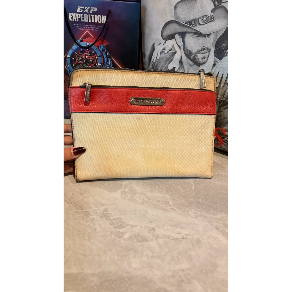 prelove donini biana clutch baca keterangan
