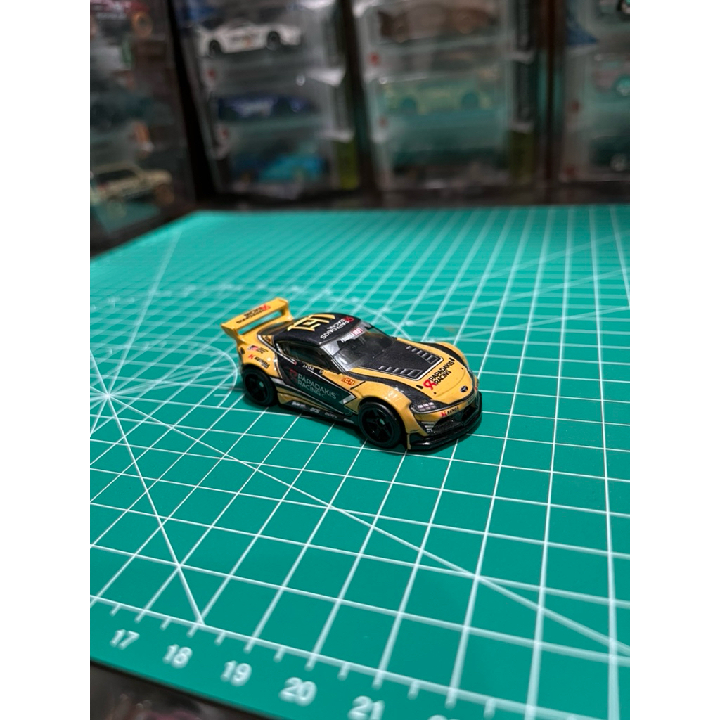 hot wheels toyota gr supra team transport premium kuning