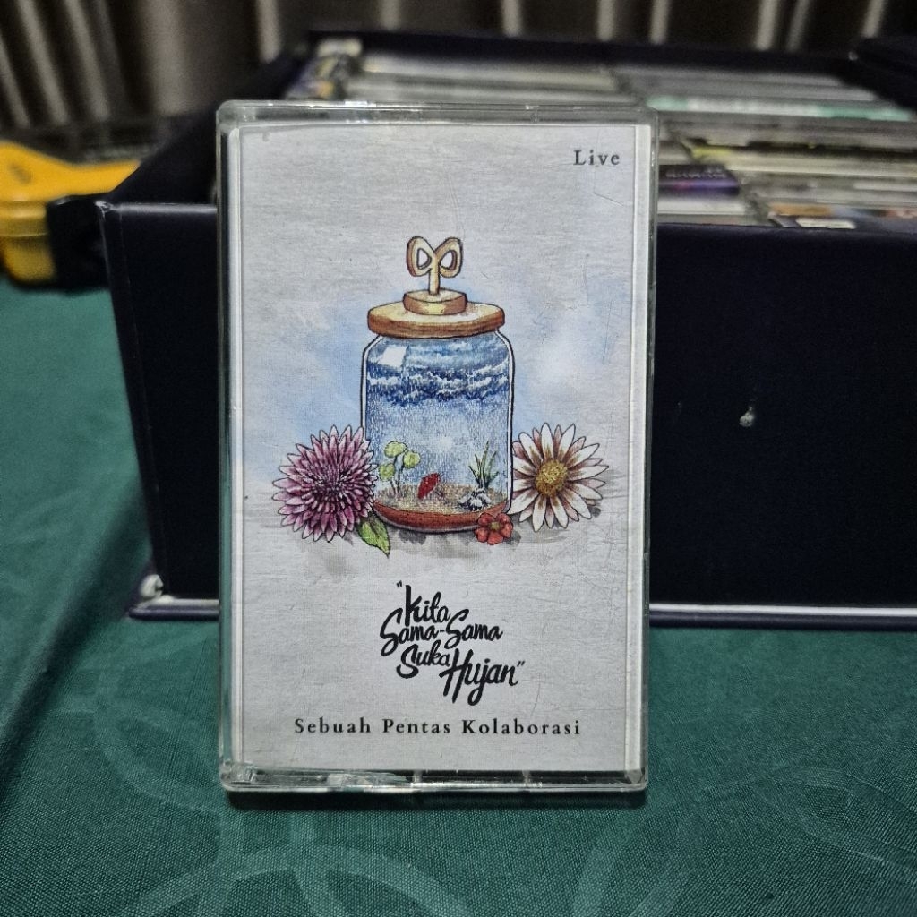 kaset pita kita sama sama suka hujan live konser sebuah pentas kolaborasi banda neira gardika gigih 