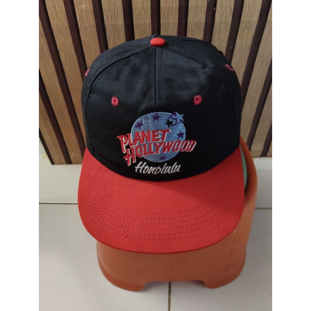 topi second planet holllywood dan hard rock cafe