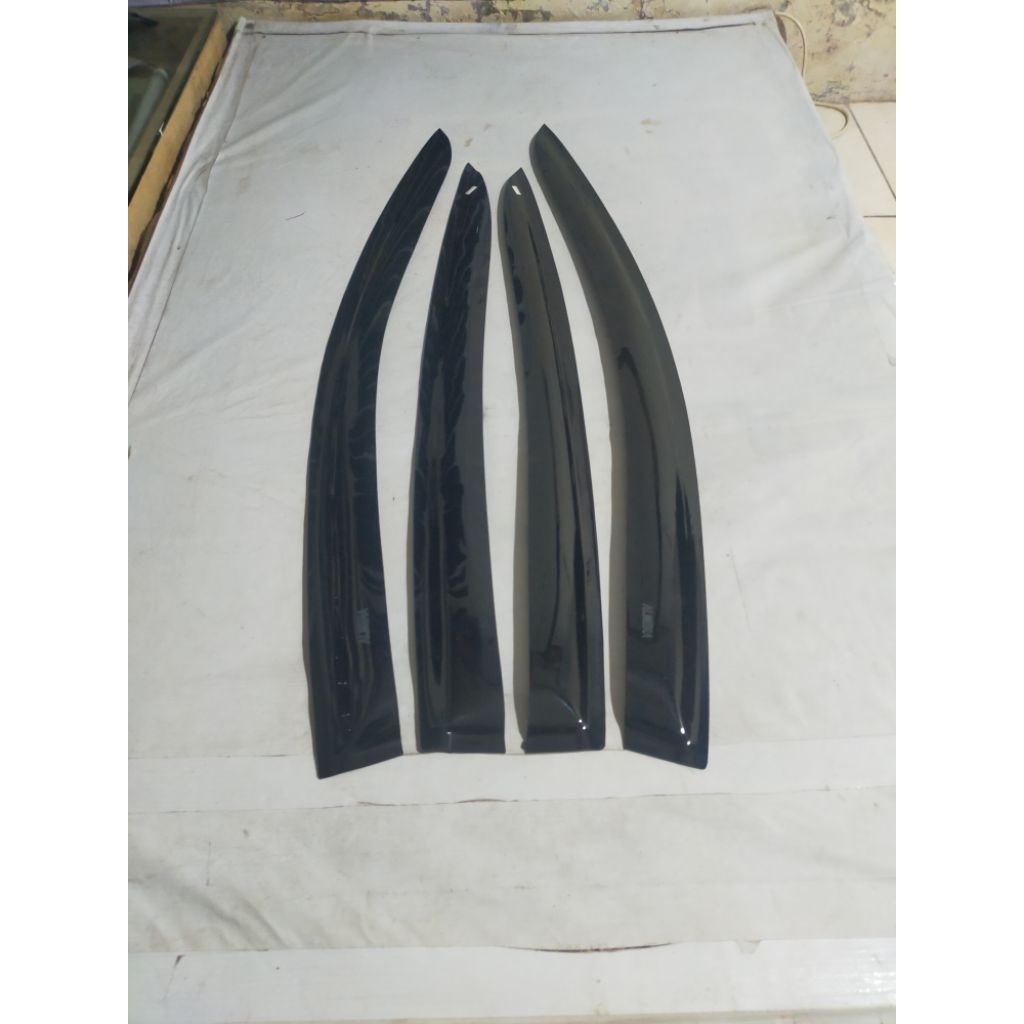 Talang air mobil Nissan Almera slim