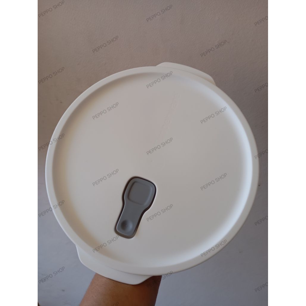 Tutup click to go round Tupperware