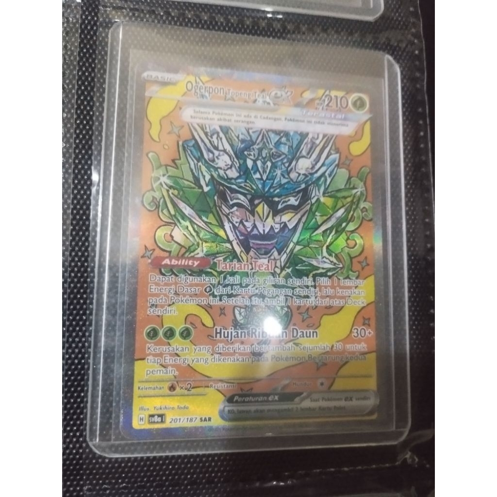 Ogerpon topeng teal sar kartu pokemon indonesia