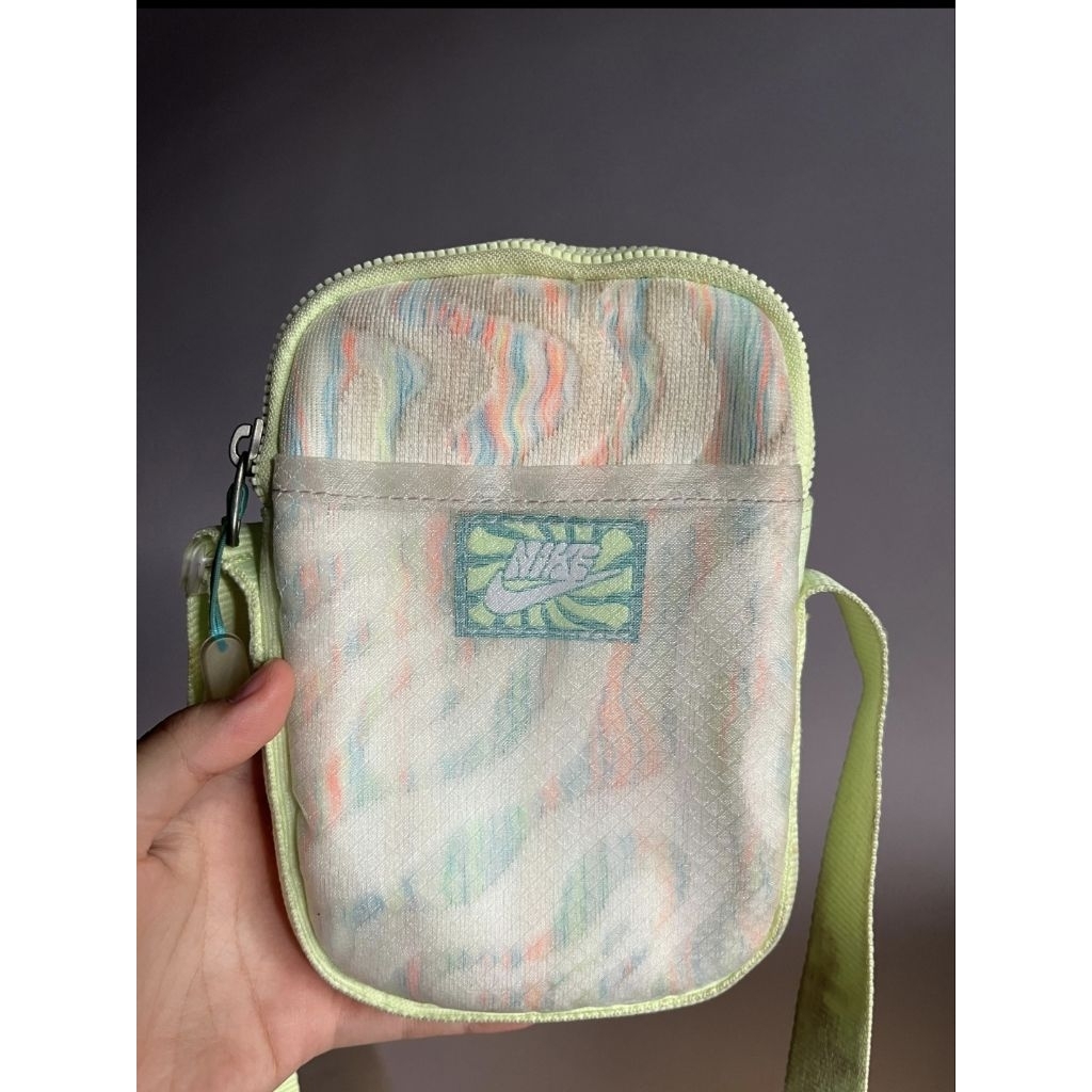 PRELOVED Nike Heritage Crossbody Bag in the Barely Volt/White/Dusty Cactus colorway.