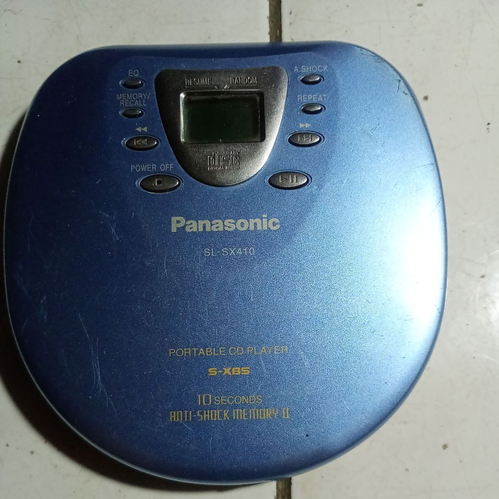 discman panasonic SL-SX410 adaptor 4.5v 1 ah menggunakan batrai 2xAAA 2.4V PORTABLE CD PLAYR  bekas 