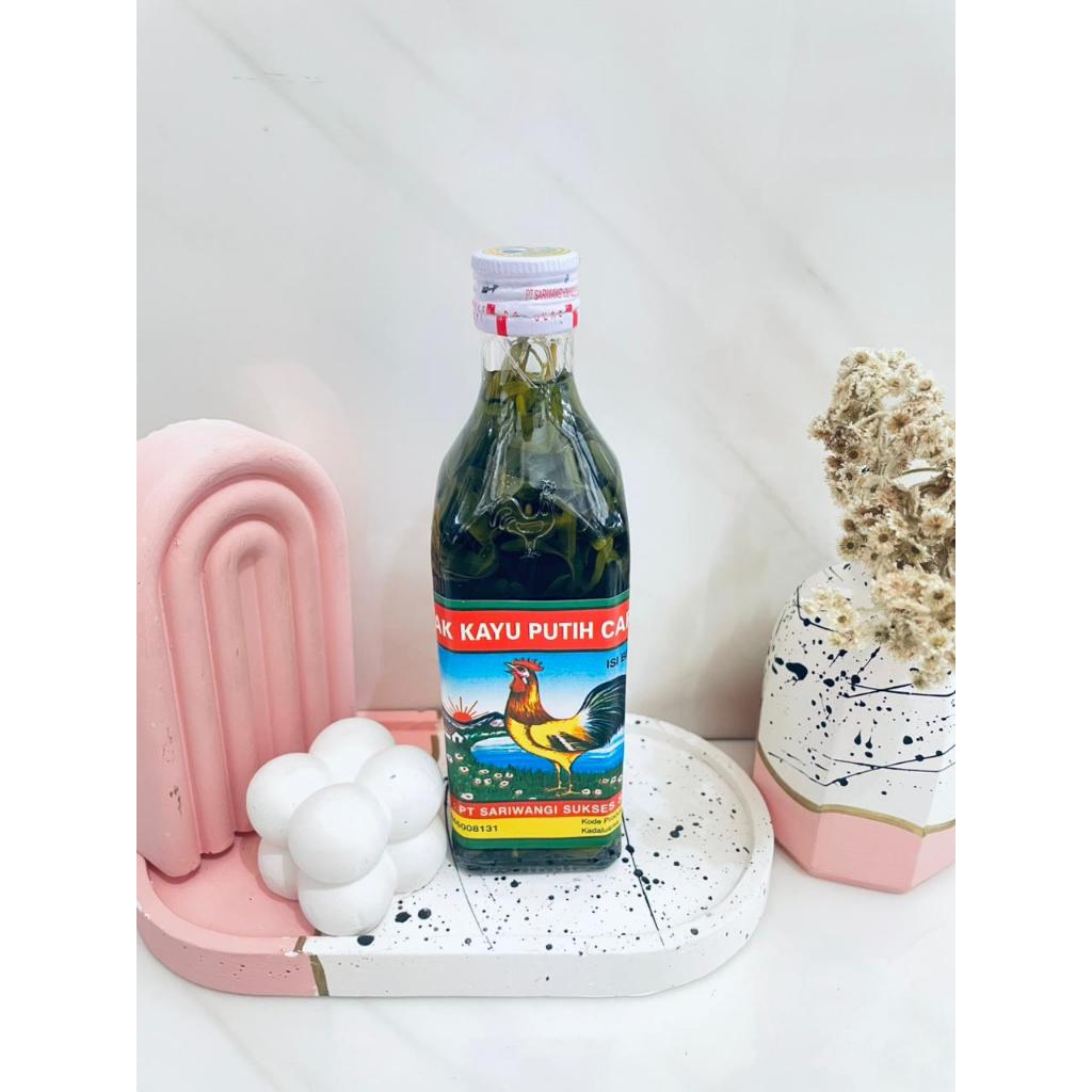 MINYAK KAYU PUTIH CAP AYAM 150ML DENGAN RENDAMAN DAUN INGGU
