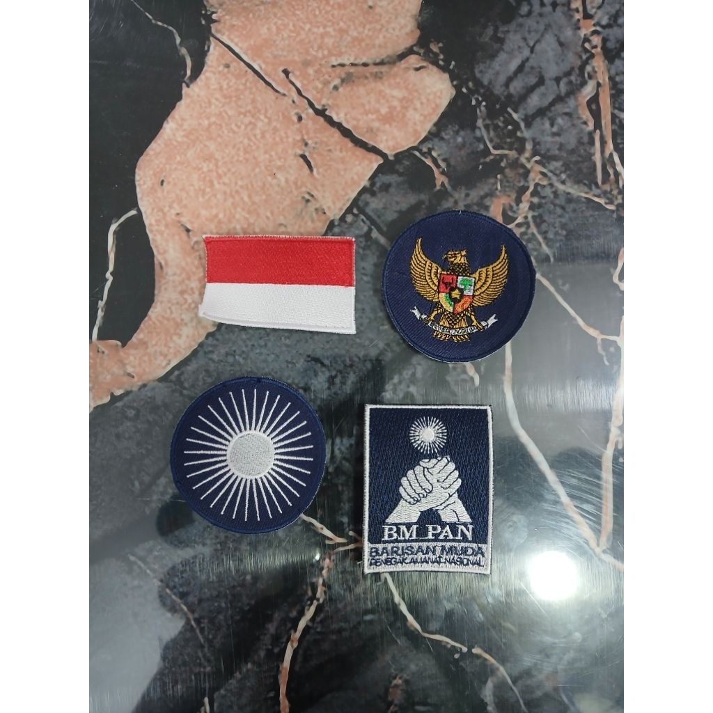 logo bordir bet garuda bulat pan matahri BM Pan merah putih