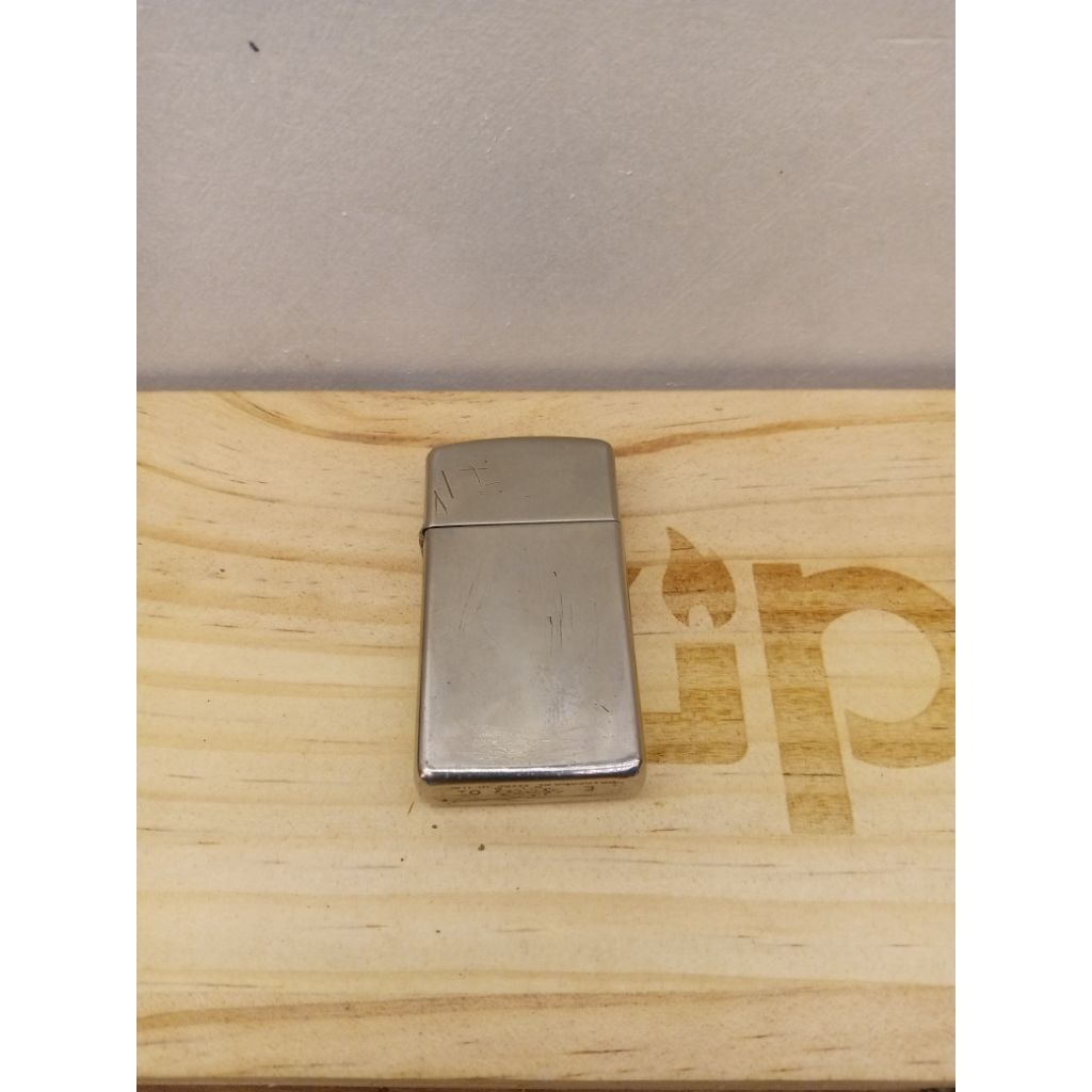 original zippo slim high polish chrome