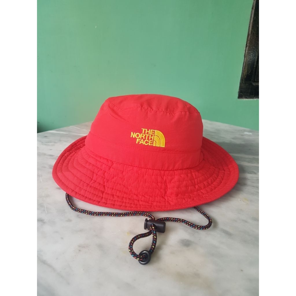 topi tnf