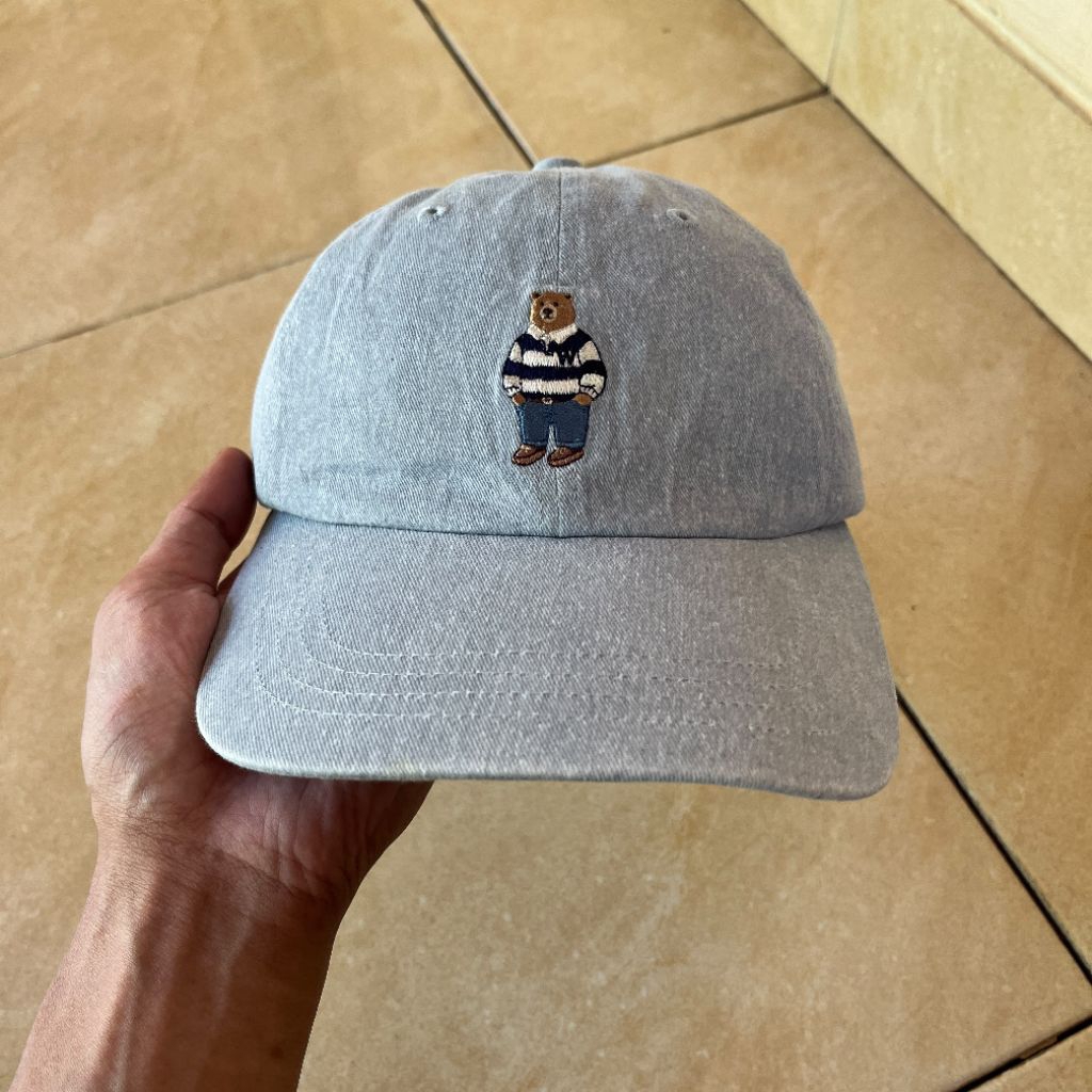 topi who AU logo bear