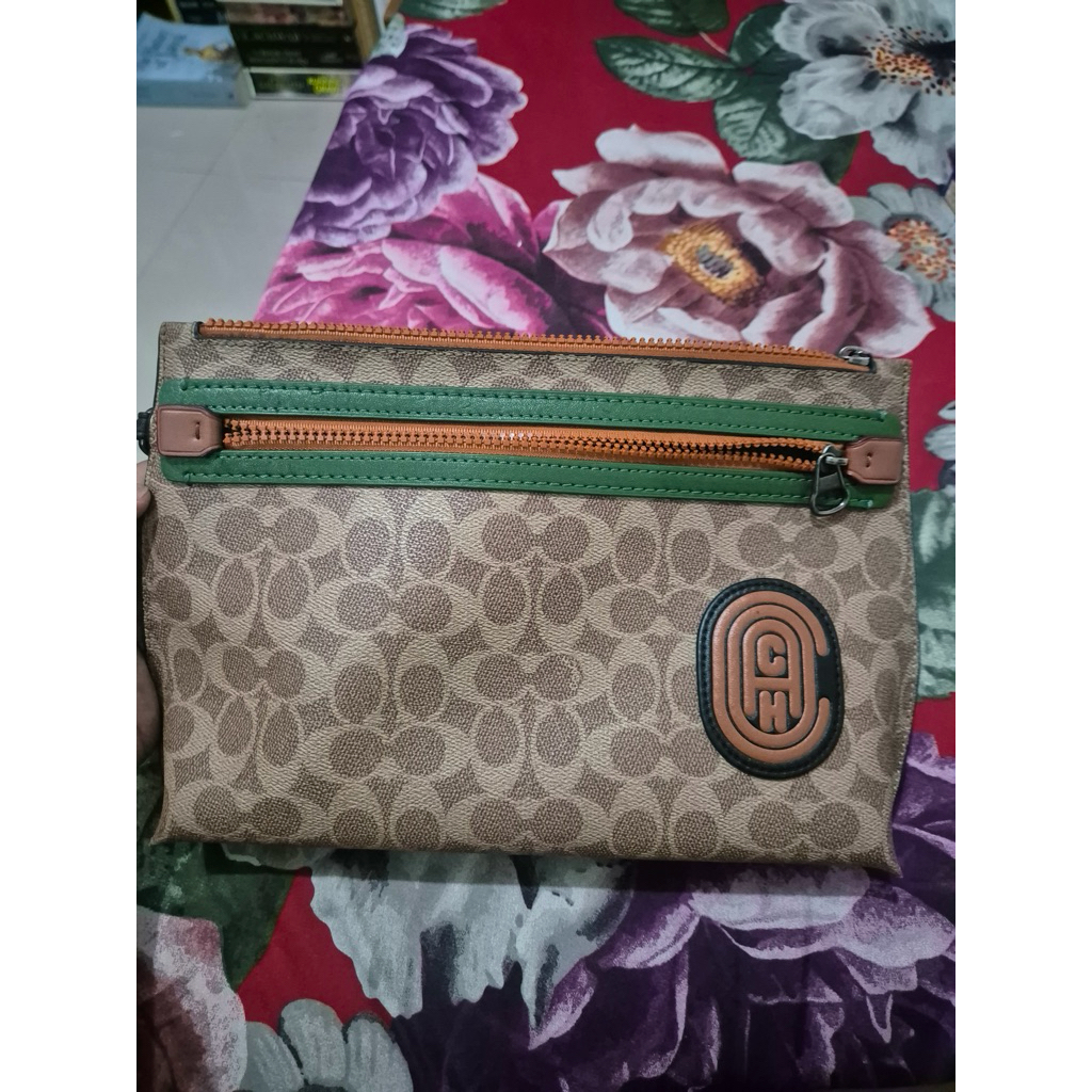 (PRELOVED) Coach outlet clutch pouch