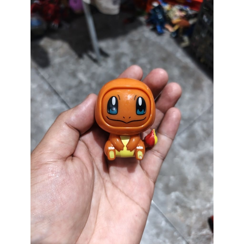 figure changing face pokemon charmander