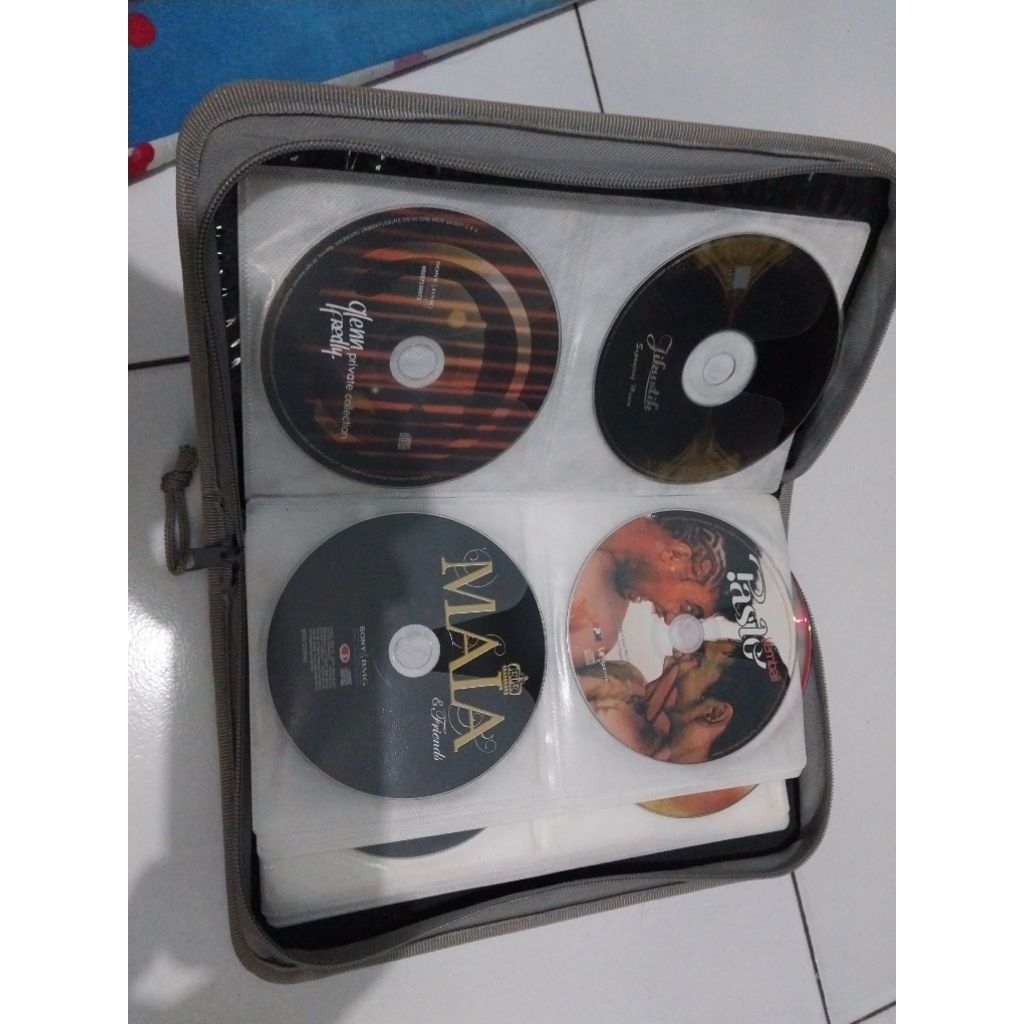 CD original tanpa sampul + tas cd