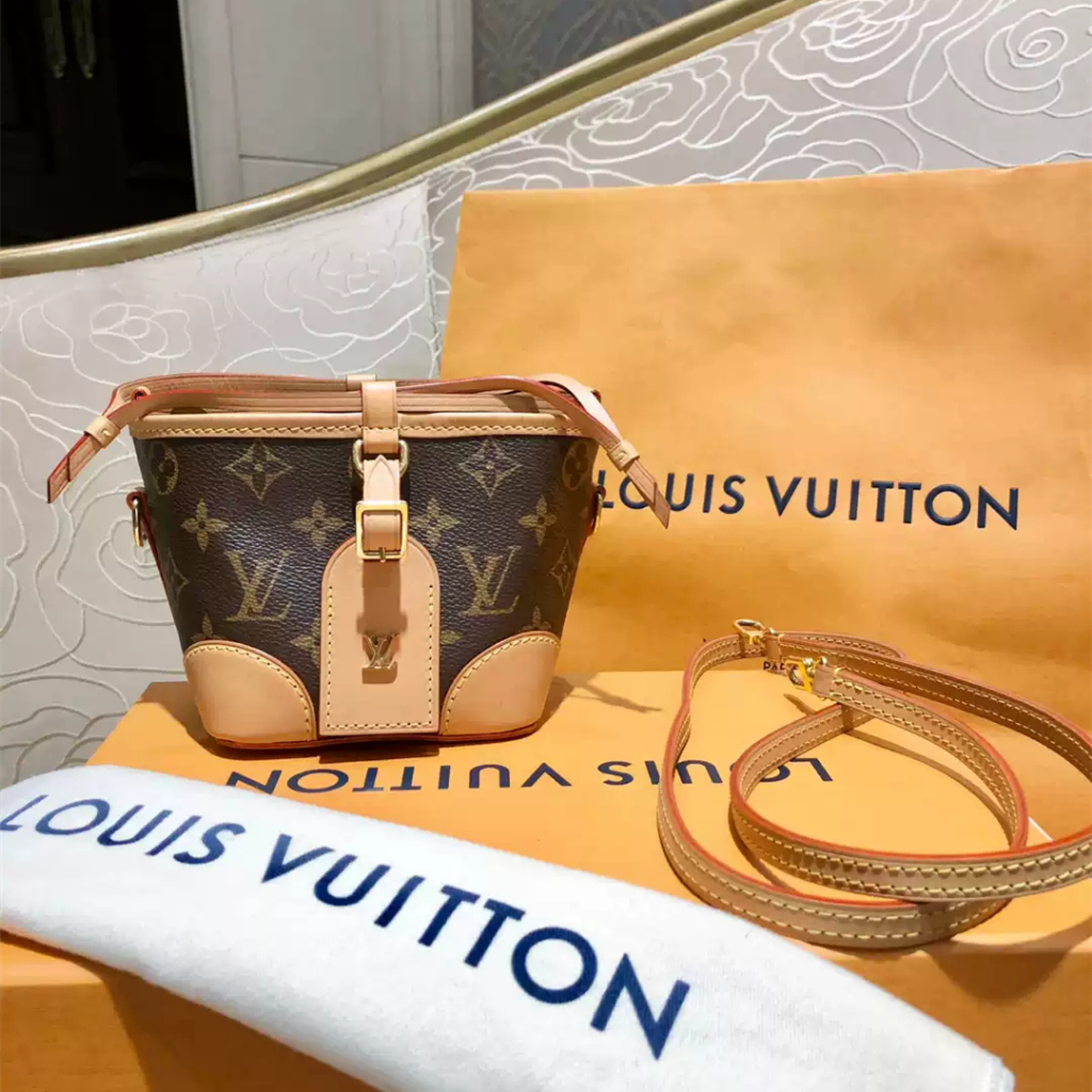 Tas Louis Vuitton Noé M57099, tas bucket berbahan kulit sapi dengan motif Monogram cokelat klasik. D