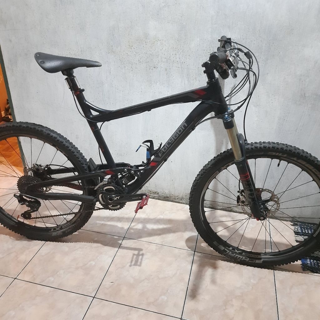 sepeda gunung downhill mtb polygon collosus tx deore xt