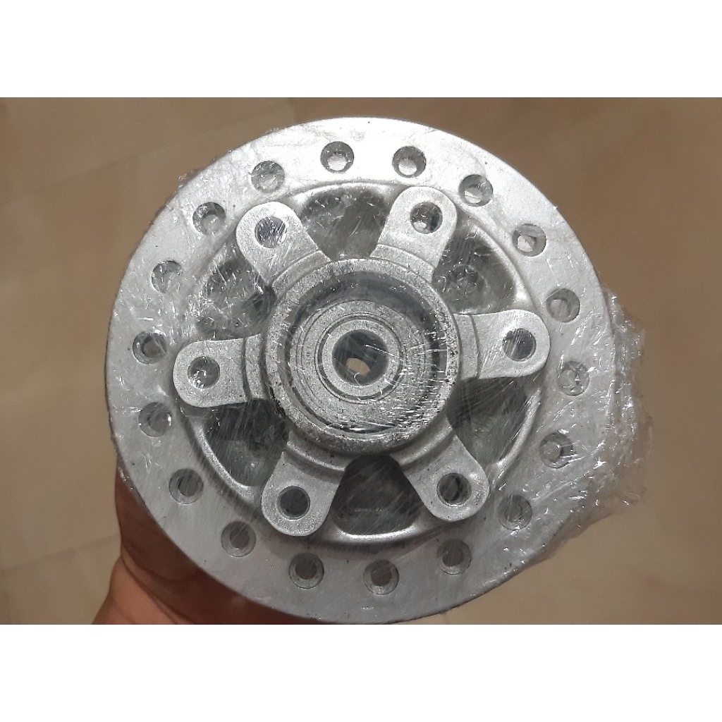 Tromol depan tiger revo,tirev original