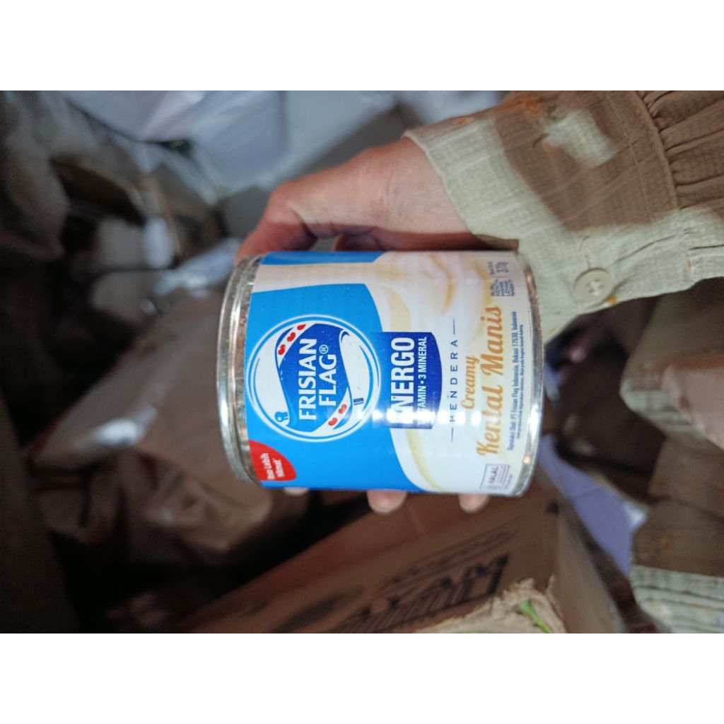 susu  frisian flag putih kaleng 370g
