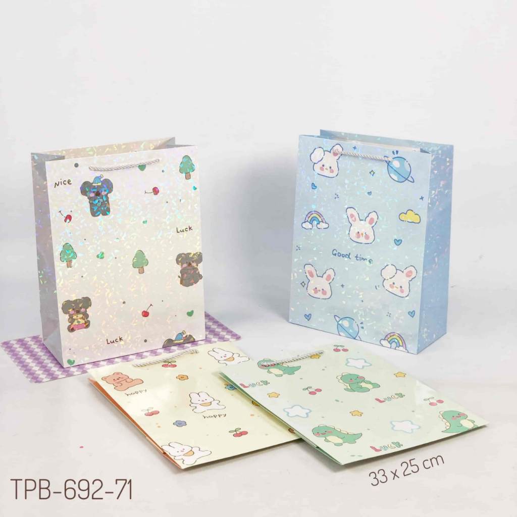 TPB 692-71 - ISI 12 PAPERBAG POTRAIT MEDIUM UK 33X25X11,5 CM MTF ANIMAL KOMB HOLO W MIX
