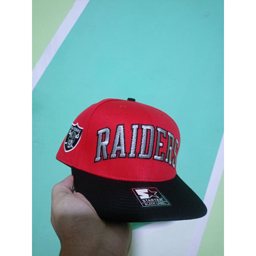 Topi Snapback Raiders Arch