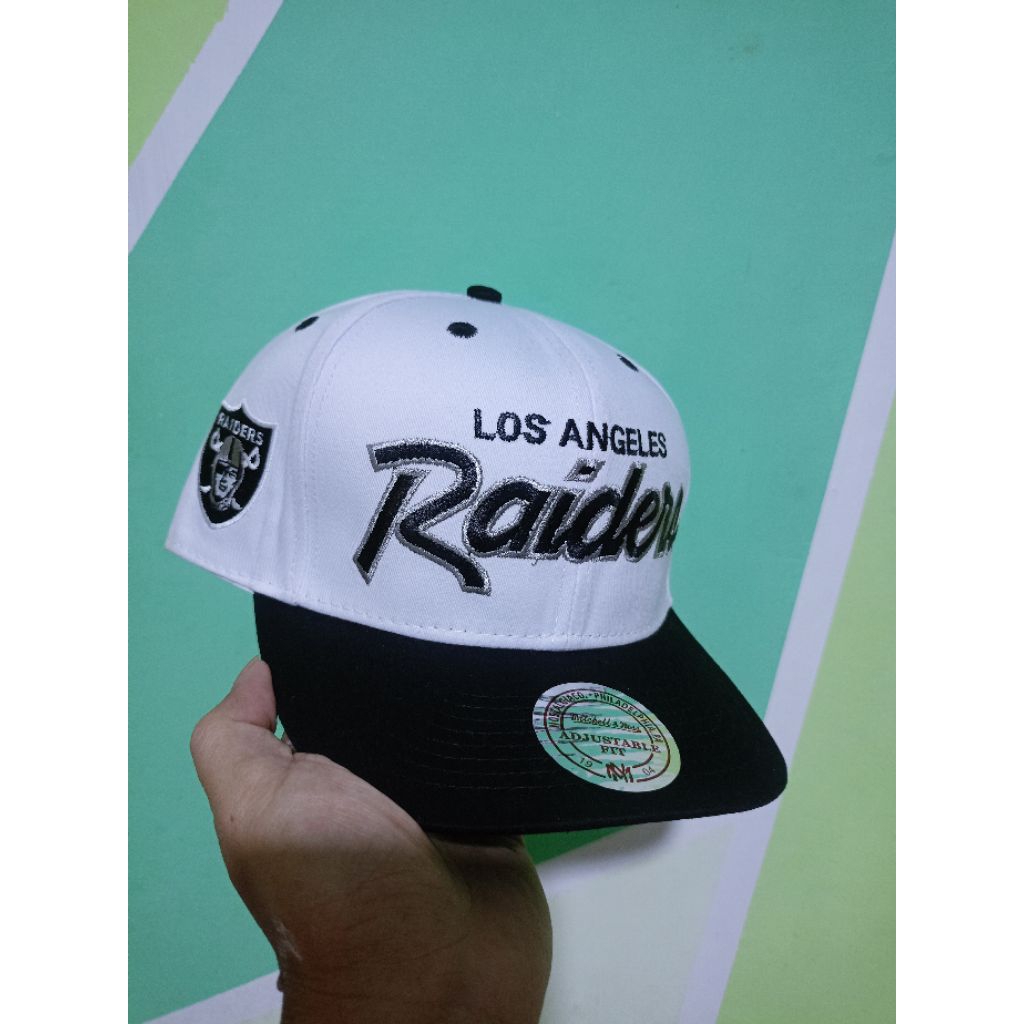 Topi Snapback Raiders Script White