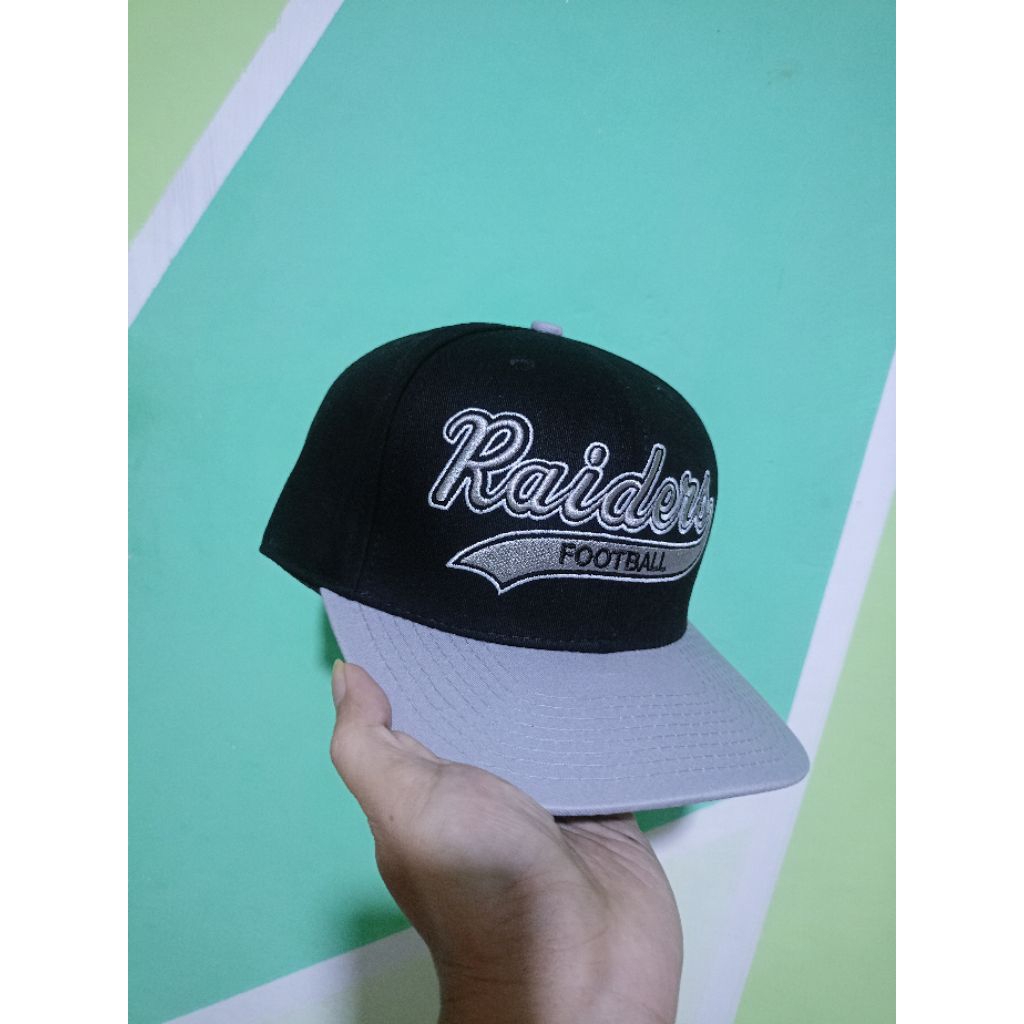 Topi Snapback Raiders Tailsweep