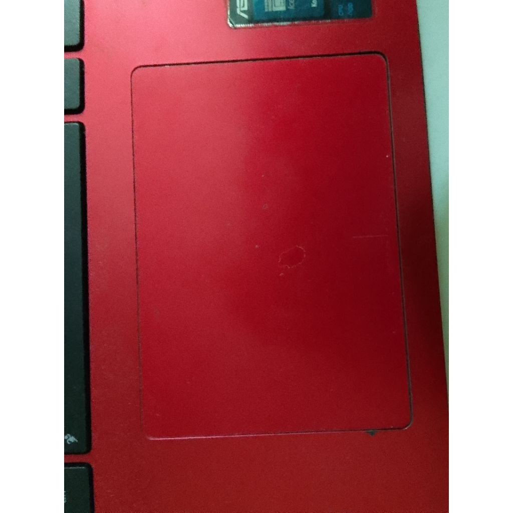 Touchpad Laptop Asus X453S warna merah kondisi normal bekas copotan