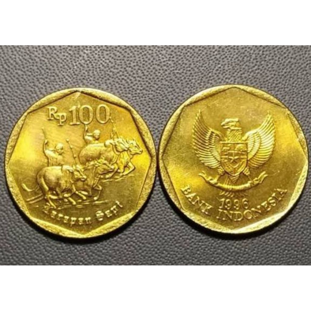 uang koin Rp.100 gambar karapan sapi