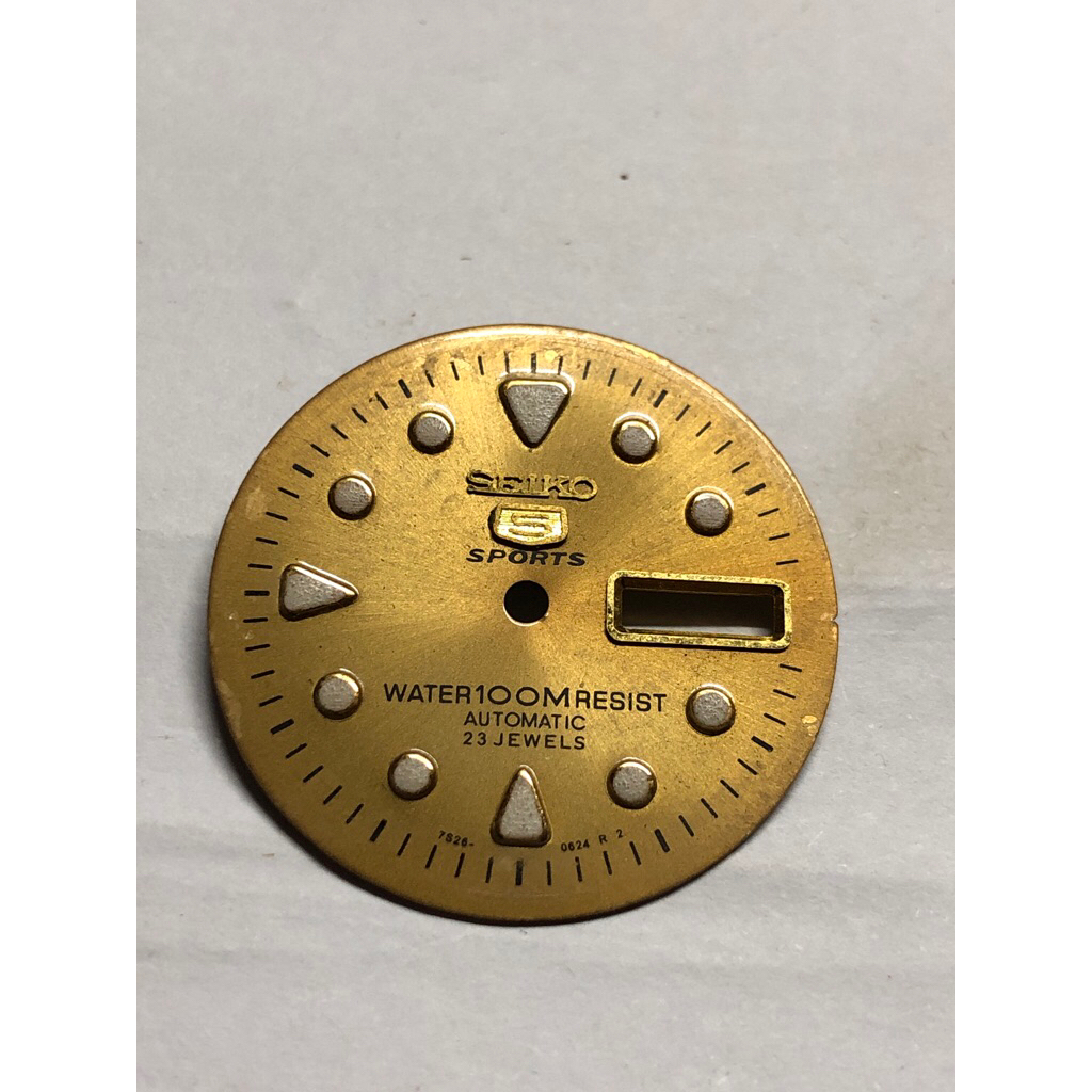 dial seiko diver original gold warna nya