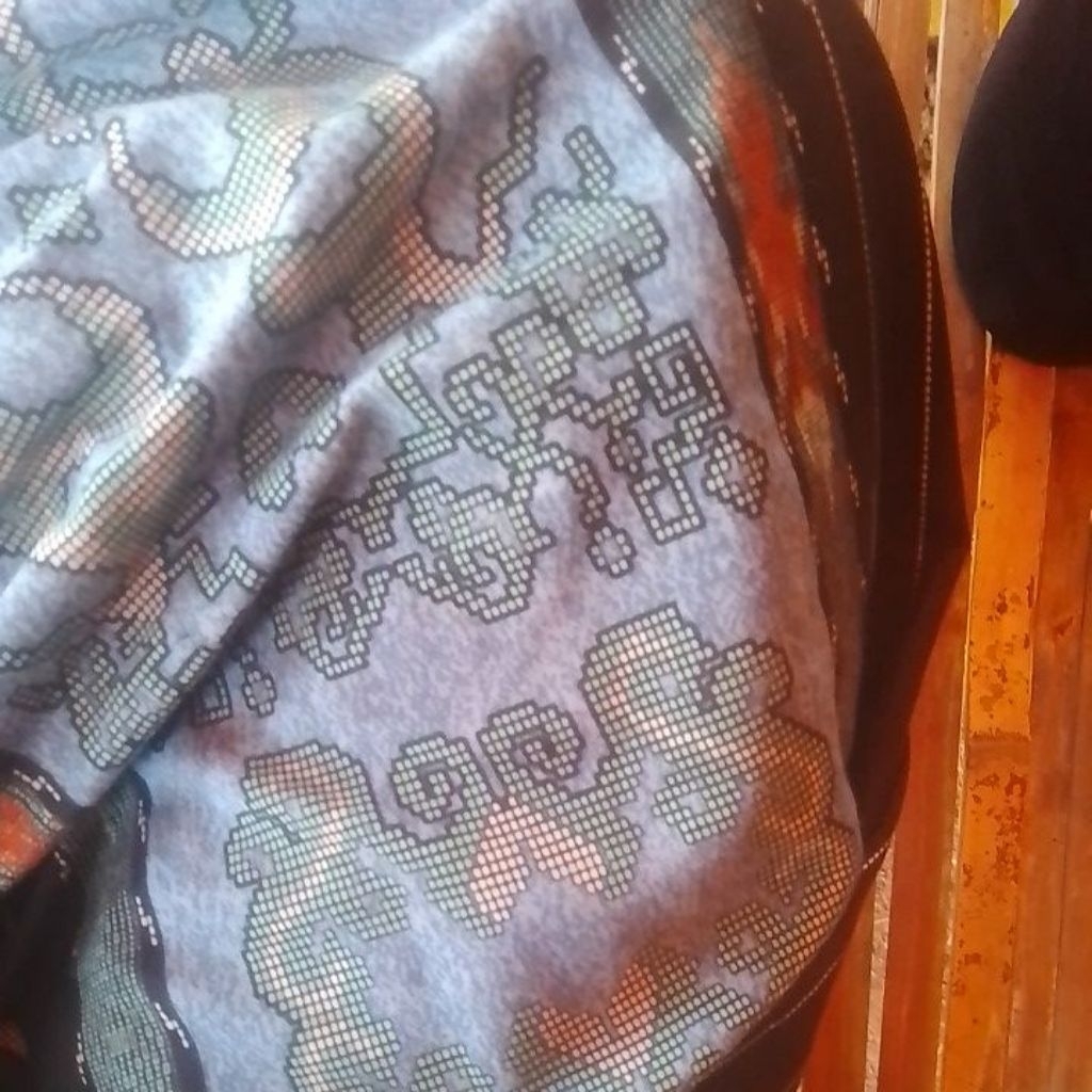 sarung bekas berkelas