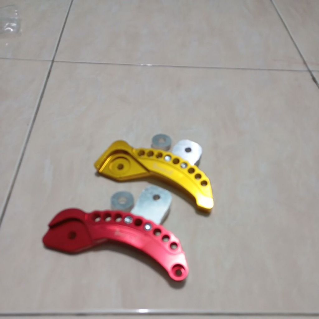 Undur undur peninggi pemundur shock bracker belakang motor Yamaha matik