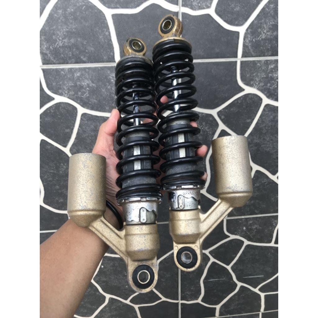 sok belakang Tiger revo original copotan