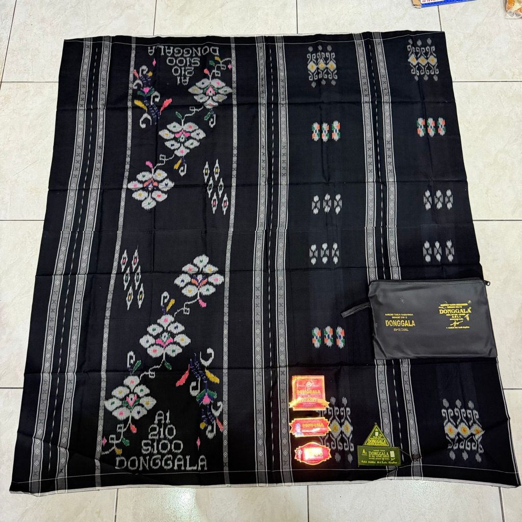 Sarung tenun donggala S-100 jahit tengah