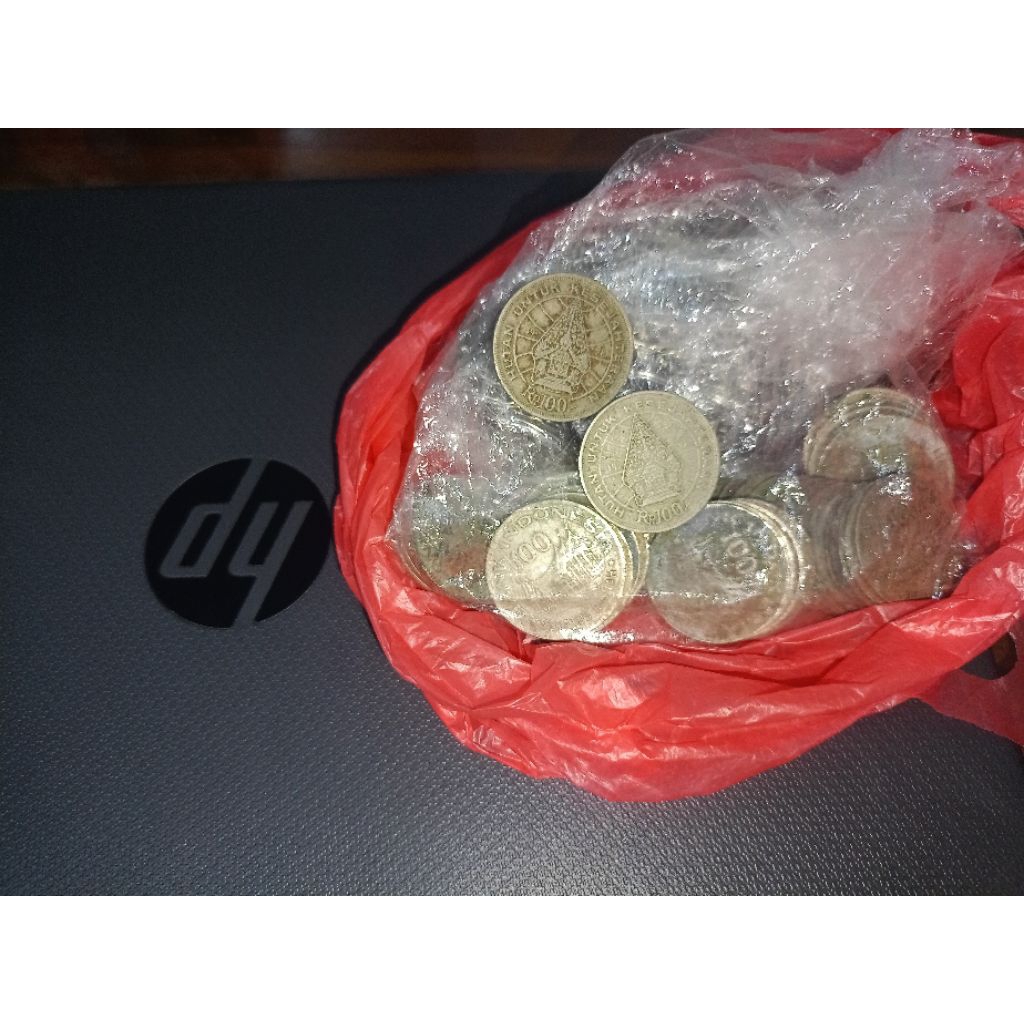 Koin 100 rupiah wayang (bekas)