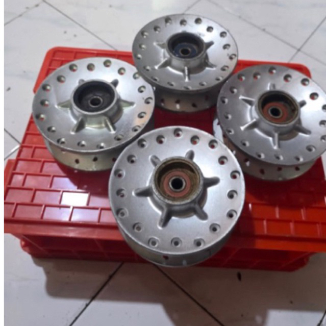 Tromol depan sym original