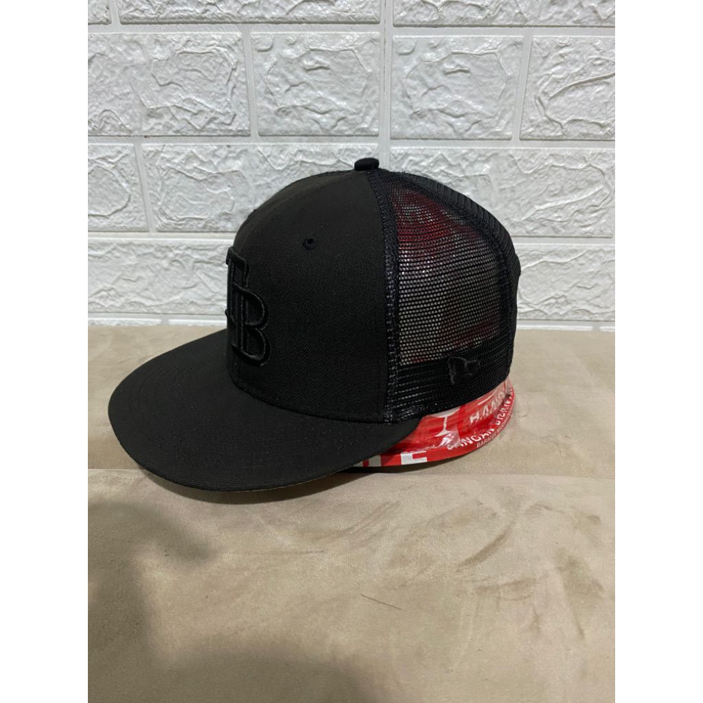 topi new era trucker