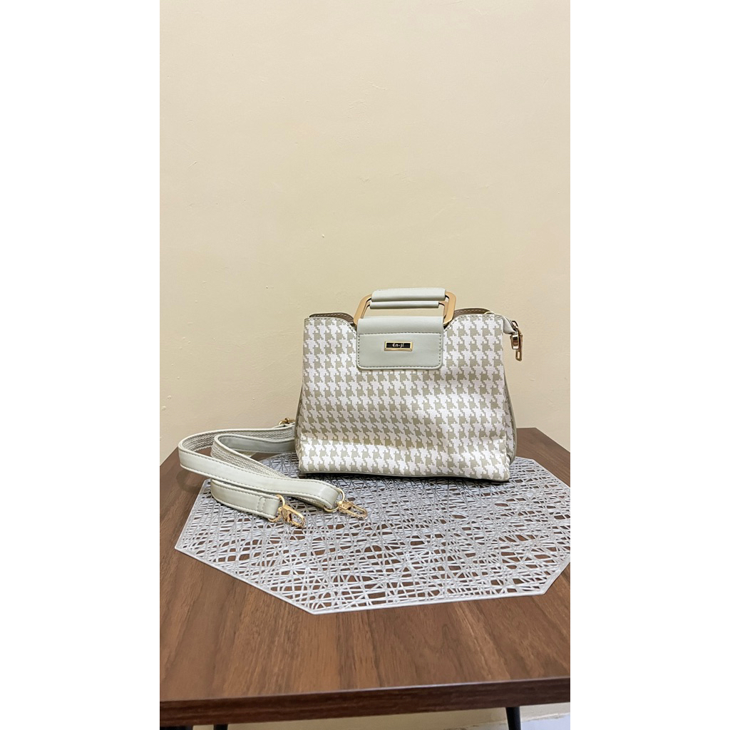 enji hand and sling bag