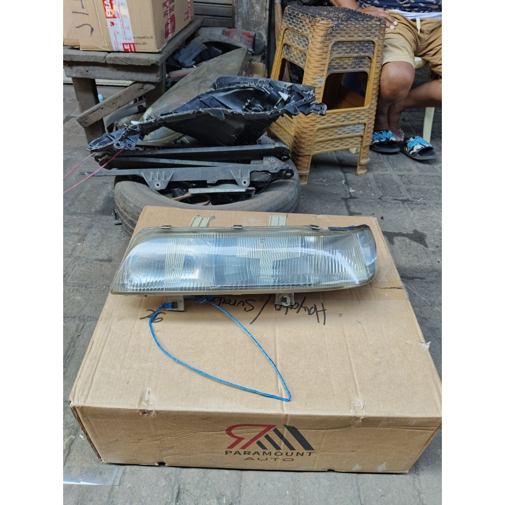 Headlamp grand civic original.