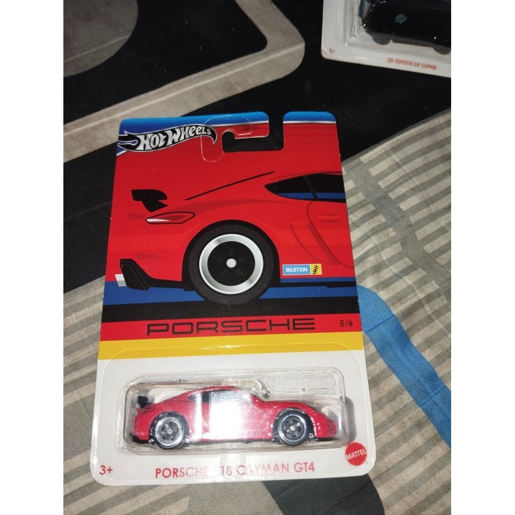 hotwheels Porsche Cayman gt4 merah