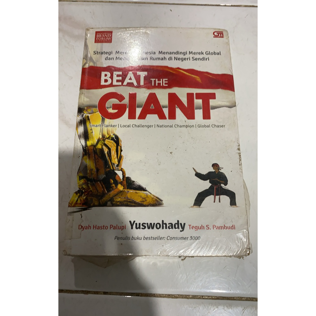 Buku beat the giant Strategi merek indonesia menandingi merek global dan menjadi tuan rumah di neger