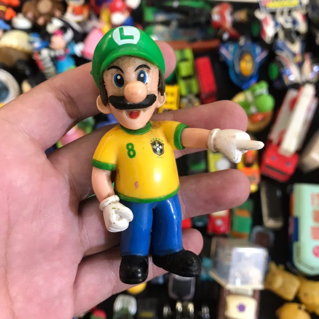 Vintage. Mario Bros Luigi Mini Brazilian Soccer Figure- Soccer ball on forehea