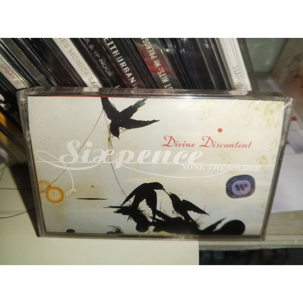 Kaset pita Sixpence Nine the Richer - Divine Discontent (SEGEL)