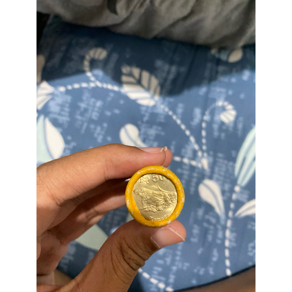 koin 50 komodo