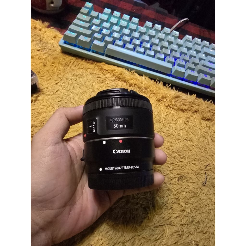 Lensa Canon 50 mm F 1 8 dengan converter eos M canon ori bekas